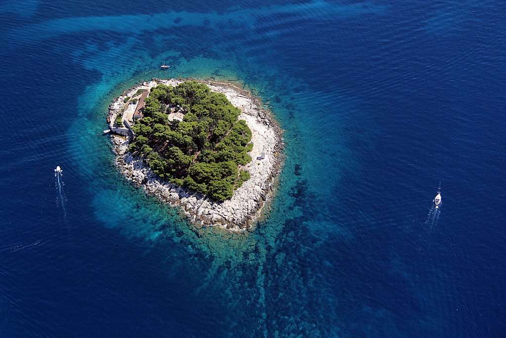 Croatia Remains a Top Sailing Destination in 2026 – Discover the Reasons - Croatian Island, clear blue sea / Croatia Sailing with SunLife charter