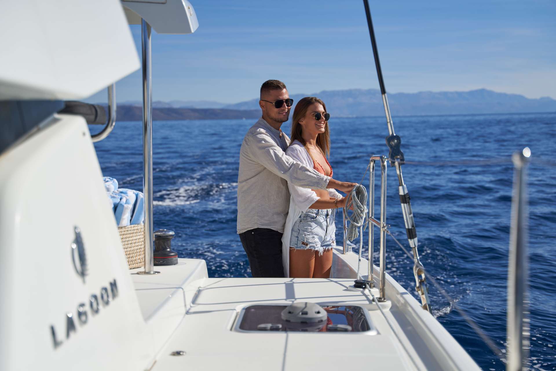 Croatia Remains a Top Sailing Destination in 2026 – Discover the Reasons - Couple on Catamaran | SunLife Charter Experience